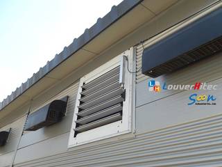 Improving natural ventilation with electric louver at piggery, Soon Industrial Co., Ltd. Soon Industrial Co., Ltd. Powierzchnie handlowe Aluminium/Cynk