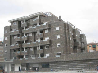 Diseño y construcción de un edificio residencial en Granada, dcr arquitecto dcr arquitecto Casas passivas Concreto