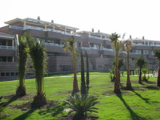 Diseño de una urbanización en la Zubia, Granada, dcr arquitecto dcr arquitecto Habitações multifamiliares Tijolo