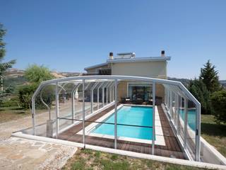 La piscina per tutte le stagioni, Isobit s.r.l. Isobit s.r.l. Giardino con piscina