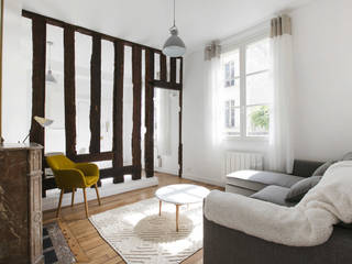Rénovation minimaliste et fonctionnelle d’un appart à Paris, ATELIER FLORENT - Architectes d'Intérieur Paris ATELIER FLORENT - Architectes d'Intérieur Paris Living room Wood Wood effect