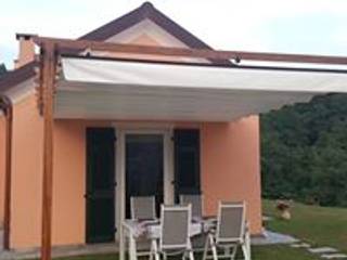 Pergola in legno da esterno con Tenda a Baldacchino, TUTTOLEGNO di Badano TUTTOLEGNO di Badano Сад Дерево Дерев'яні