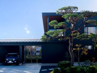 ＨＵ 厂型の屋根の家, 塚野建築設計事務所 塚野建築設計事務所 Casas de estilo industrial Metal