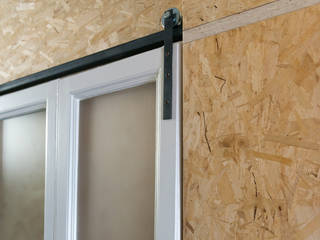 Osb style, ghostarchitects ghostarchitects Sliding doors OSB Beige