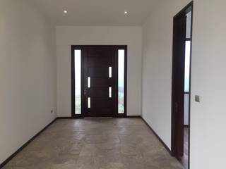 Construcción de Casa en Santiago por ARQSOL, Arqsol Arqsol Front doors