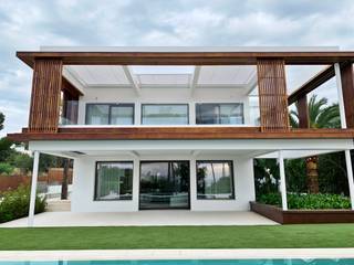 Toldos veranda en vivienda de lujo en Mallorca , Área Deluxe Área Deluxe Balcones y terrazas de estilo moderno Textil Ámbar/Dorado