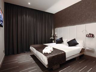 Alfombra en Hotel Petit Palace , Interiorismo 3P Interiorismo 3P Floors Textile Amber/Gold
