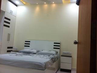 Mrs Amrita | Mantri celestia hyderabad | 2 BHK, Pramri Interiors Pramri Interiors Classic style bedroom