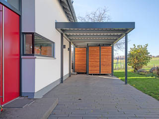 Modernes Carport für Einfamilienhaus , Siebau Raumsysteme GmbH & Co KG Siebau Raumsysteme GmbH & Co KG 일세대용 주택 우드 우드 그레인