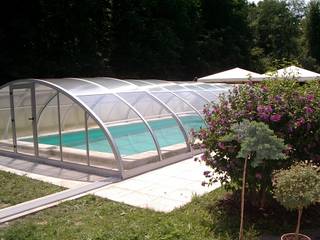 Zadaszenia basenów Gracja Sun, GRACJA SP. Z O.O. GRACJA SP. Z O.O. Moderne zwembaden Aluminium / Zink