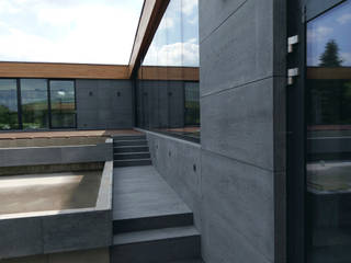 Pomysł na schody: beton architektoniczny, Luxum Luxum Industrialne ściany i podłogi Beton