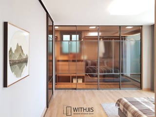 현대건설 이천역세권 모델하우스 시공사례, WITHJIS(위드지스) WITHJIS(위드지스) Moderne Ankleidezimmer Aluminium/Zink Bernstein/Gold