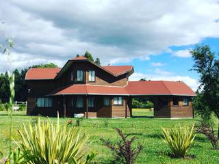 Vivienda V, Nomade Arquitectura y Construcción spa Nomade Arquitectura y Construcción spa Casas unifamiliares Madera Acabado en madera