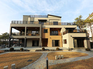 넓은 테라스가 있는 철근콘크리트 주택 (경기도 용인시), 더존하우징 더존하우징 二世帯住宅