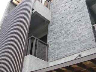 台中市南區的現代電梯別墅, 勻境設計 Unispace Designs 勻境設計 Unispace Designs Tường & sàn phong cách hiện đại