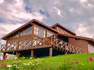 Casas y cabañas de Madera -GRUPO CONSTRUCTOR RIO DORADO (MRD-TADPYC) Classic style houses