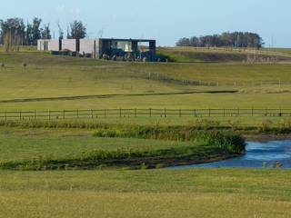 CASA ZORZAL, NATURHABITAT NATURHABITAT Передний двор Дерево Эффект древесины