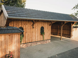 Vielseitige Remise aus Holz, steda - So muss das! steda - So muss das! Rustic style garage/shed Wood Wood effect