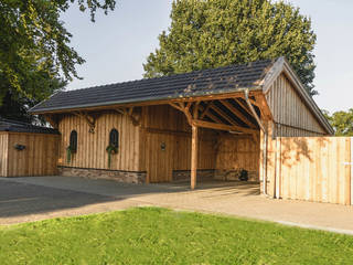 Vielseitige Remise aus Holz, steda - So muss das! steda - So muss das! Rustic style garage/shed Wood Wood effect