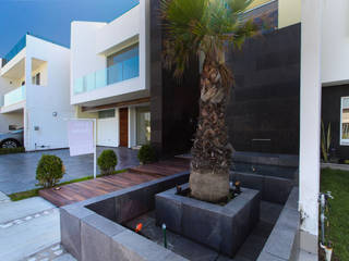 Residencia Mombeltran 72, Herrera Arquitectos H&H Herrera Arquitectos H&H Modern houses