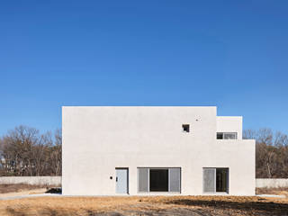 Ivory House, Lee Jae Architects Lee Jae Architects Casas de estilo moderno