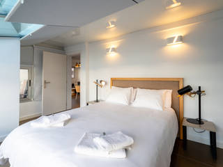 Reforma de vivienda vacacional Rooftop Suite, Living Las Canteras, SMLXL-design SMLXL-design Modern style bedroom