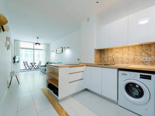 Reforma de vivienda vacacional, Sorimba Beach, SMLXL-design SMLXL-design Minimalist kitchen