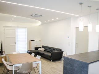 Una casa riportata a nuova vita - 120 mq, Studio ARCH+D Studio ARCH+D Salas de estar modernas Branco
