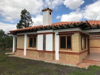 CASA SACHICA, cesar sierra daza Arquitecto cesar sierra daza Arquitecto Casas campestres Piedra