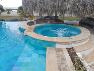 PISCINA BORDE INFINITO EN LA ISLA DE BARÚ (CARTAGENA DE ÍNDIAS), JAVIER NIEBLES Arquitecto JAVIER NIEBLES Arquitecto สระว่ายน้ำอินฟินิตี้ คอนกรีตเสริมแรง