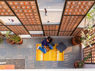 Design for 4,000 sq. ft. at Ranjangaon Ganpati, Pune, M+P Architects Collaborative M+P Architects Collaborative Modern balcony, veranda & terrace Bricks Orange
