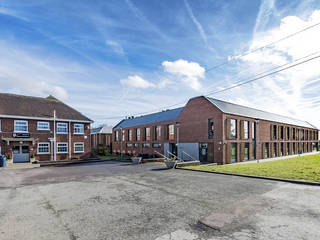 Beaumont School and Sports Hall, Designcubed Designcubed Schools Bricks Red