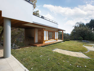 bi-house, 웰하우스종합건축사사무소 웰하우스종합건축사사무소 Casas modernas