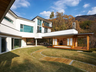 bi-house, 웰하우스종합건축사사무소 웰하우스종합건축사사무소 Casas modernas