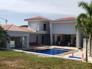 Casa unifamiliar en Girardot, Parámetro Arquitectura & Ingeniería Parámetro Arquitectura & Ingeniería Casas unifamiliares