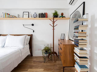 Quarto acolhedor INÁ Arquitetura Minimalist bedroom