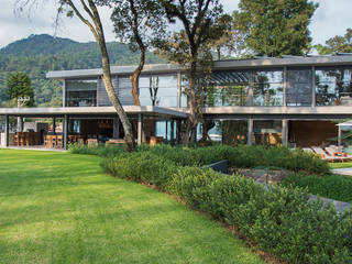 CASA LA LAGARTIJA, ESMETEVA ESMETEVA Casas de campo Metal