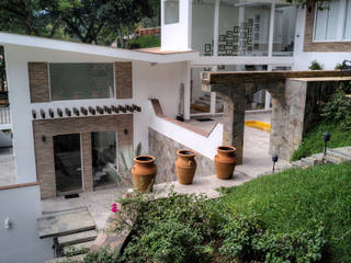 CASA COATEPEC , GRUPO WALL ARQUITECTURA Y DISEÑO SA DE CV GRUPO WALL ARQUITECTURA Y DISEÑO SA DE CV Front garden Bricks