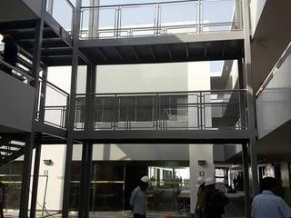 Modulo de Escaleras en Edificio, AXKAN ESTRUCTURASyCONSTRUCCION AXKAN ESTRUCTURASyCONSTRUCCION Escadas Metal