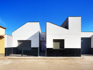Casa moderna en una planta, OOIIO Arquitectura OOIIO Arquitectura Casas unifamilares Aglomerado Blanco