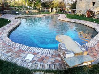 PISCINA NATURAPOOL STILE RUSTICO, PISCINE TECNOIMP PISCINE TECNOIMP Gartenpool