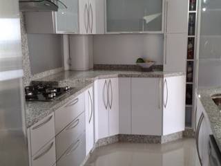 Remodelación-cocina de concepto abierto, vuolo.arteydiseño vuolo.arteydiseño 系統廚具 複合木地板 Transparent