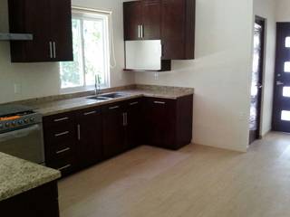 Residencia Lagos del Sol, DCA Arquitectura y Construccion DCA Arquitectura y Construccion Kitchen units Granite