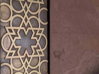 Portale in Ottone e Pietra, Ercole Srl Ercole Srl Front doors Stone