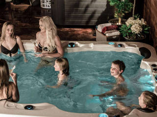 Swim Spa als Pool Alternative, SPA Deluxe GmbH - Whirlpools in Senden SPA Deluxe GmbH - Whirlpools in Senden 모던스타일 정원