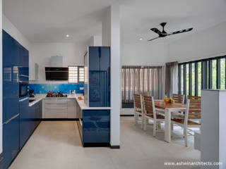 Project: Tree By The House - Interior Design - Kitchen Ashwin Architects In Bangalore Modern kitchen Furniture,Cabinetry,Property,Building,Chair,Ceiling fan,Architecture,Lighting,Home appliance,Houseplant