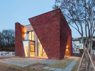 파주 서패동 단독주택, 큐제이아키텍쳐 QJARCHITECTURE 큐제이아키텍쳐 QJARCHITECTURE Country house Bricks