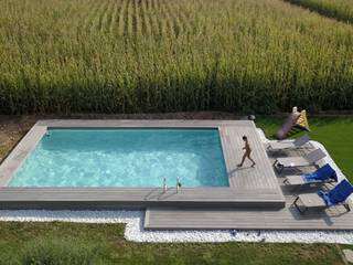 Piscina fuori terra seminterrata: Aquazzura Piscine può realizzare con facilità il tuo progetto, Aquazzura Piscine Aquazzura Piscine Garden Pool