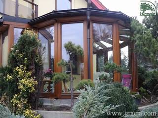 Ogród zimowy Gracja Classic, GRACJA SP. Z O.O. GRACJA SP. Z O.O. Jardines de invierno de estilo clásico Madera Acabado en madera