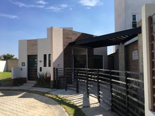 CASA PASEO, EJE Z proyectos EJE Z proyectos Casas unifamiliares Cerámico